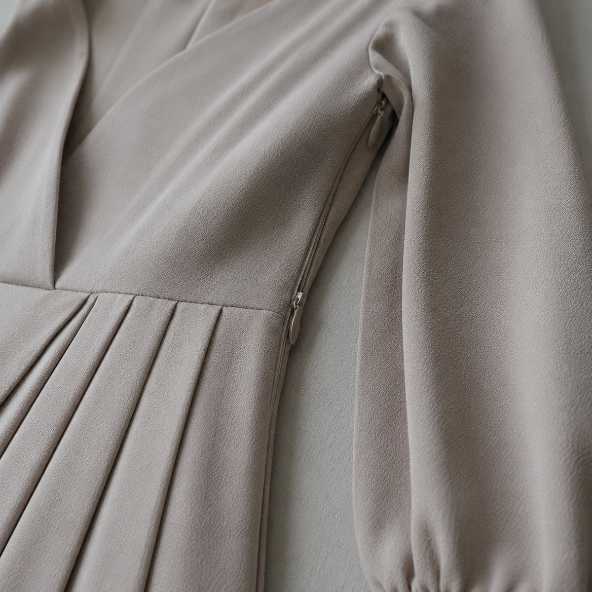 detail shot of the fabric — Chislehurst sunray-pleat midi dress, Pleated Midi Dresses by ORASCI.