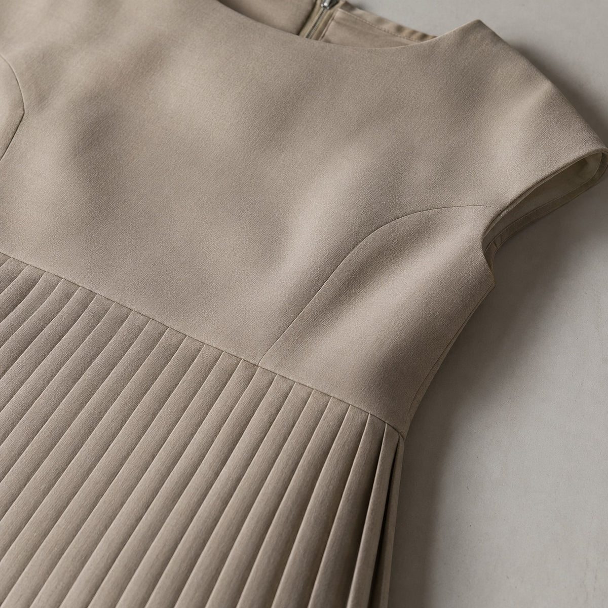 detail shot of the fabric — Alder Lane knife-pleat midi dress, Pleated Midi Dresses by ORASCI.