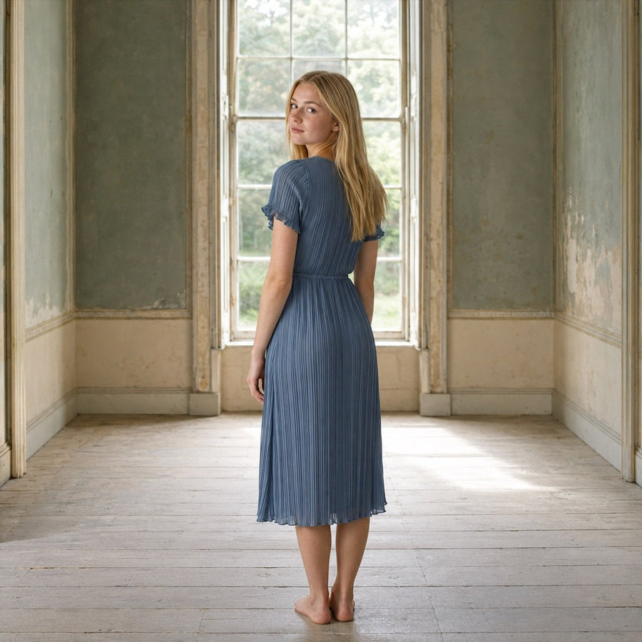 shown on the model — Bromley Vale sunray-pleat midi dress, Pleated Midi Dresses by ORASCI.
