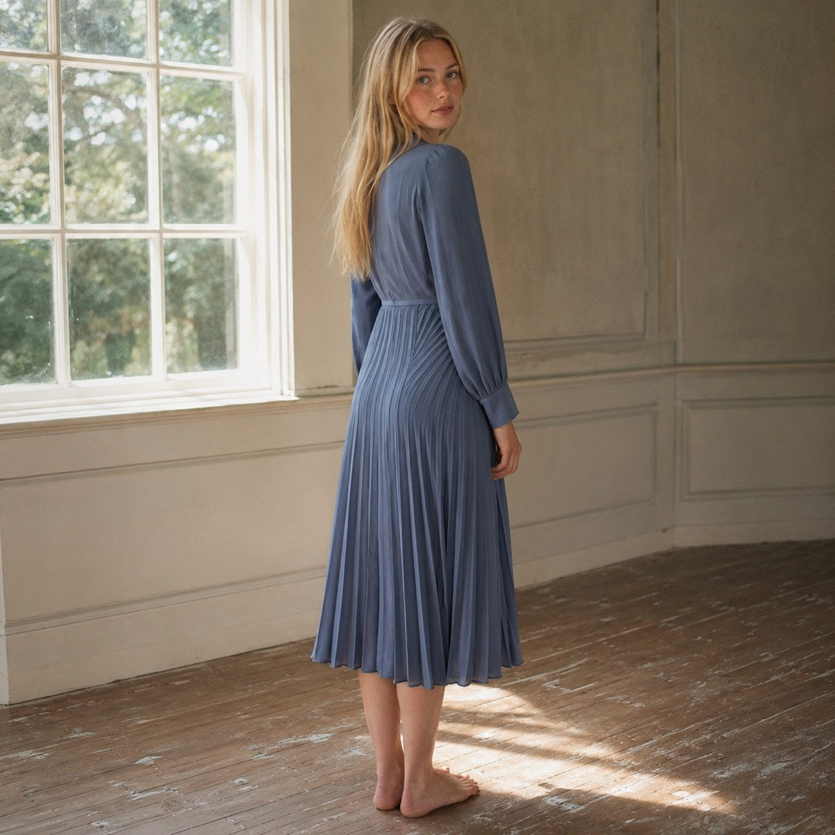 shown worn, from the side — Bromley Vale sunray-pleat midi dress, Pleated Midi Dresses by ORASCI.