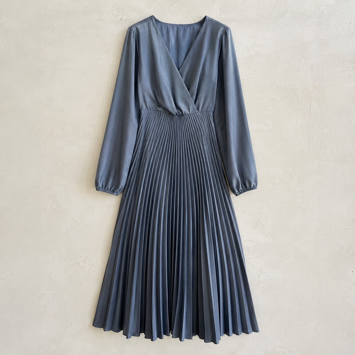 laid flat and shot from above — Elmstead sunray-pleat midi dress, Pleated Midi Dresses by ORASCI.