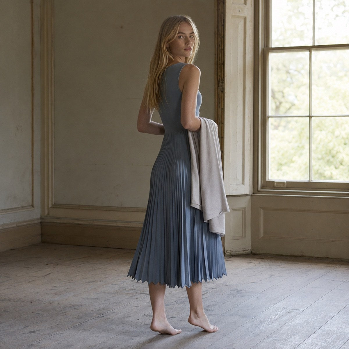 shown worn, from the side — Hayes Common sunray-pleat midi dress, Pleated Midi Dresses by ORASCI.