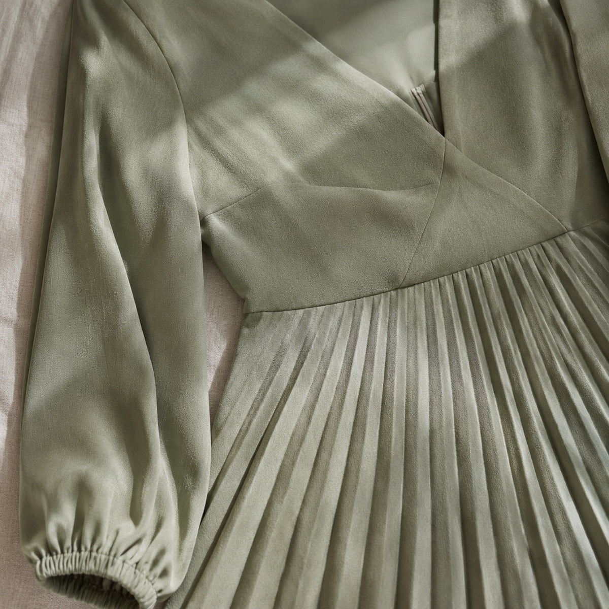 detail shot of the fabric — Orpington sunray-pleat midi dress, Pleated Midi Dresses by ORASCI.