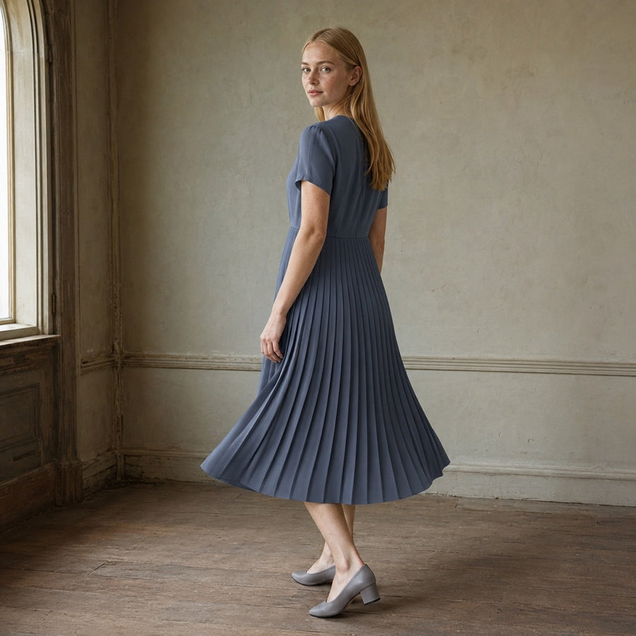 shown on the model — Slate Hollow knife-pleat midi dress, Pleated Midi Dresses by ORASCI.