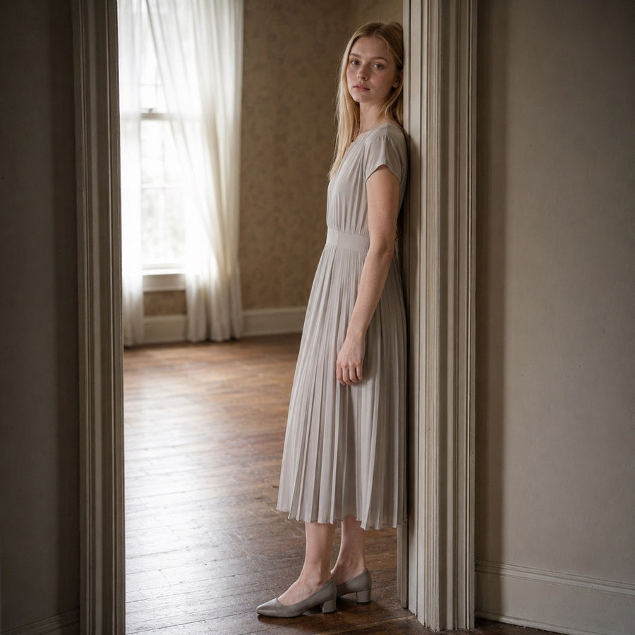 shown on the model — Sorrel Field sunray-pleat midi dress, Pleated Midi Dresses by ORASCI.