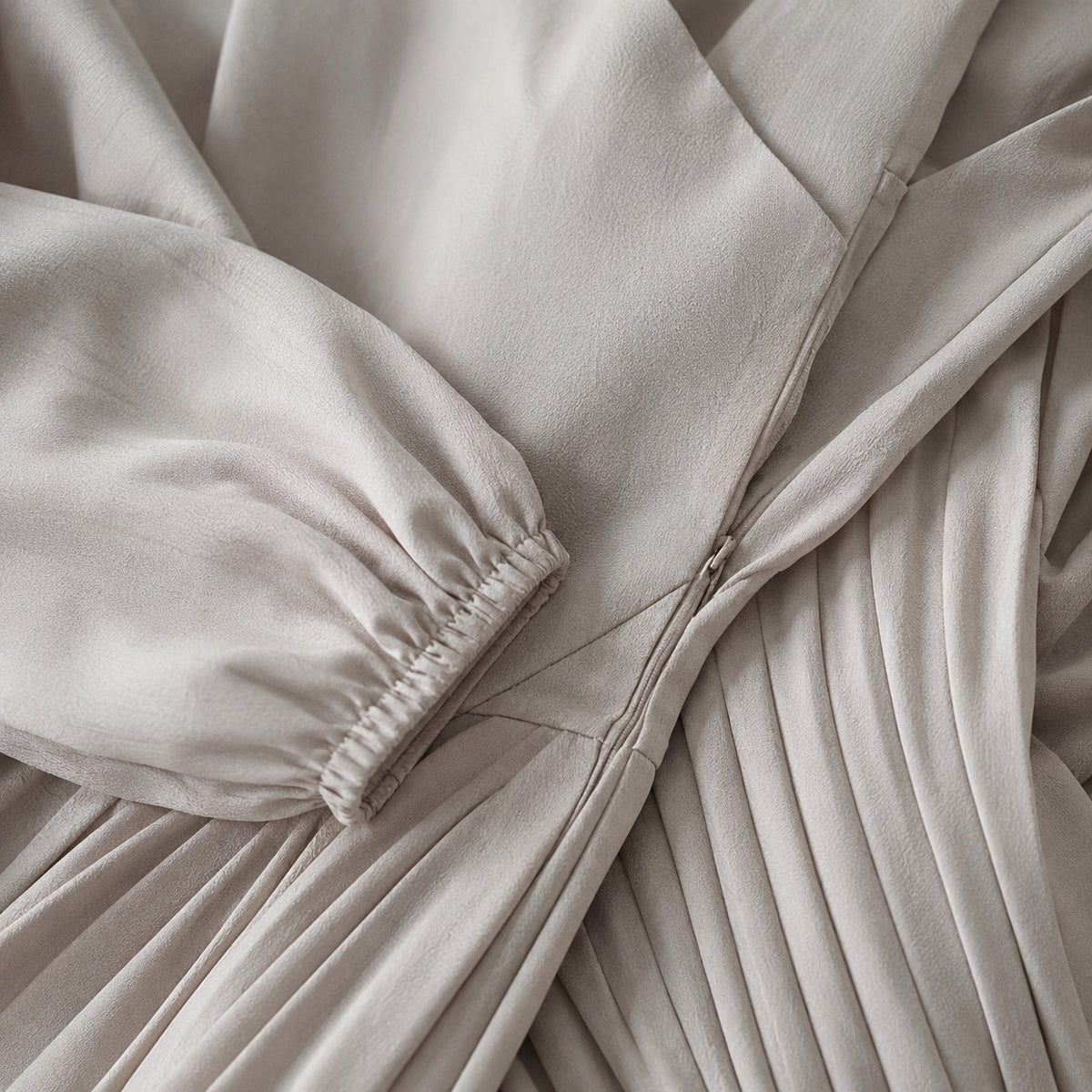 detail shot of the fabric — Keston sunray-pleat midi dress, Pleated Midi Dresses by ORASCI.