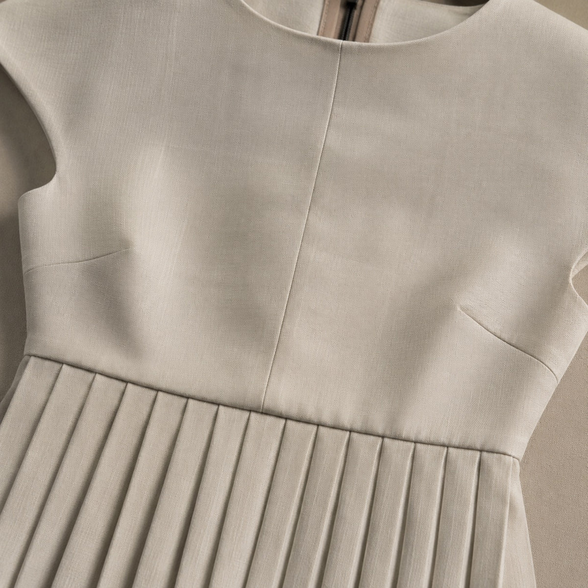 detail shot of the fabric — Willow Reach knife-pleat midi dress, Pleated Midi Dresses by ORASCI.