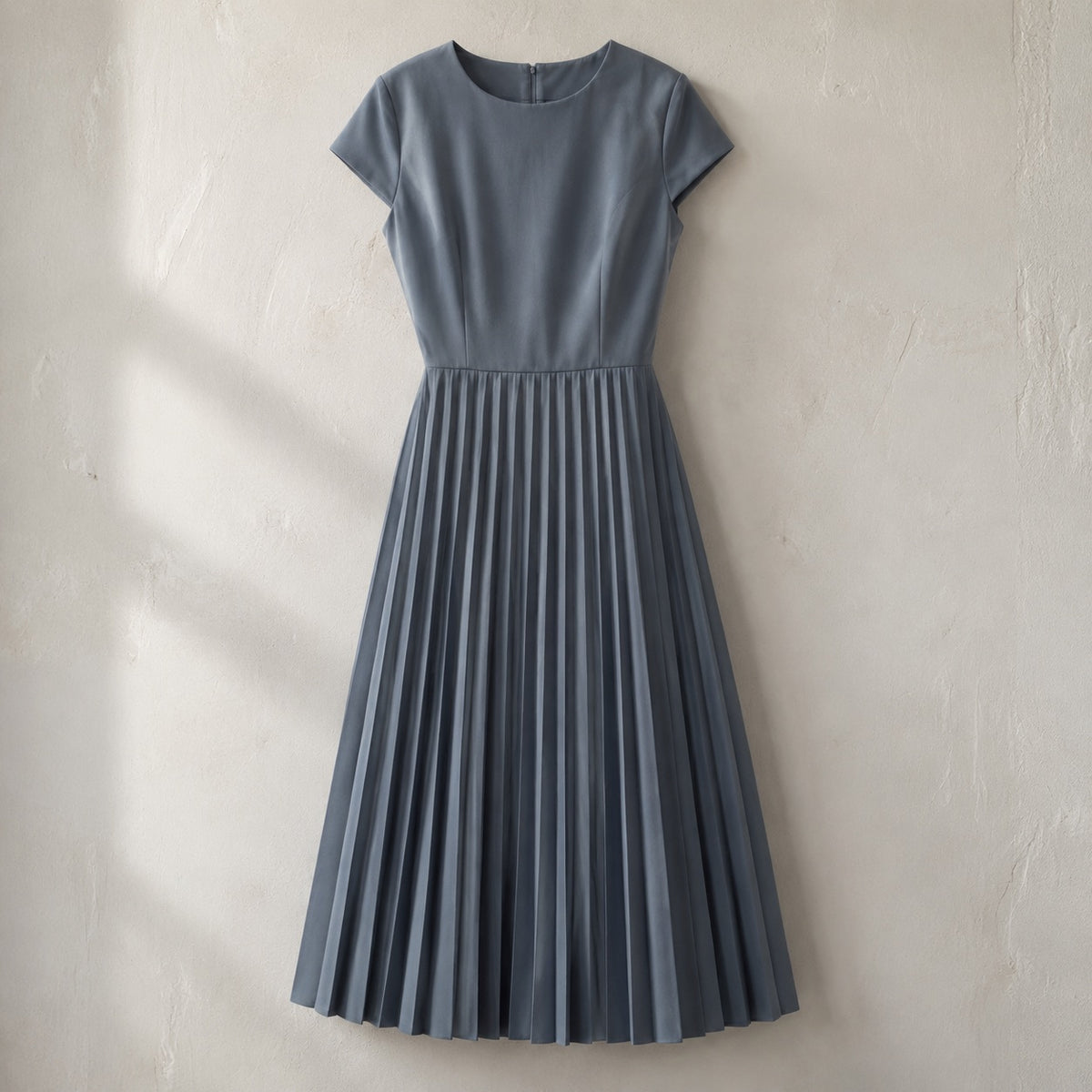 laid flat and shot from above — Willow Reach knife-pleat midi dress, Pleated Midi Dresses by ORASCI.