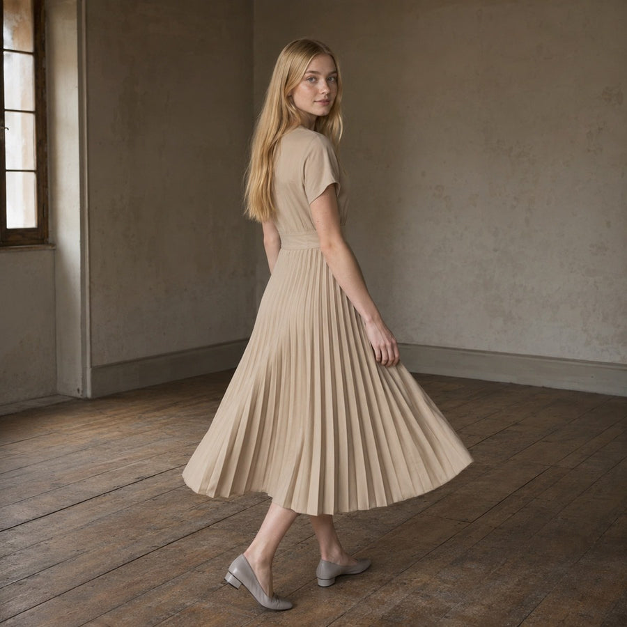 shown on the model — Petts Wood knife-pleat midi dress, Pleated Midi Dresses by ORASCI.