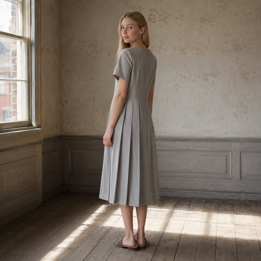 shown on the model — Pearl Wharf knife-pleat midi dress, Pleated Midi Dresses by ORASCI.