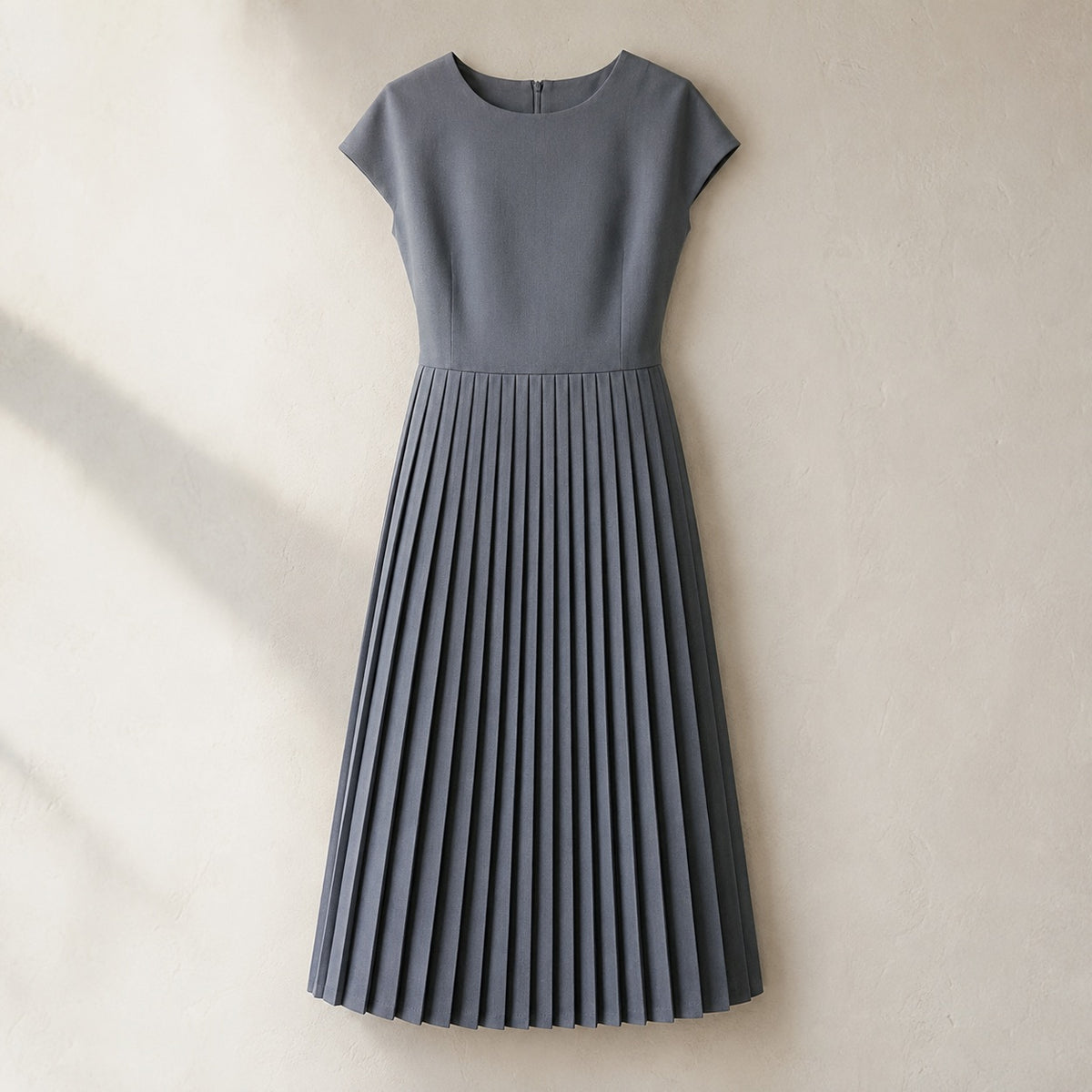 laid flat and shot from above — Hazel Court knife-pleat midi dress, Pleated Midi Dresses by ORASCI.