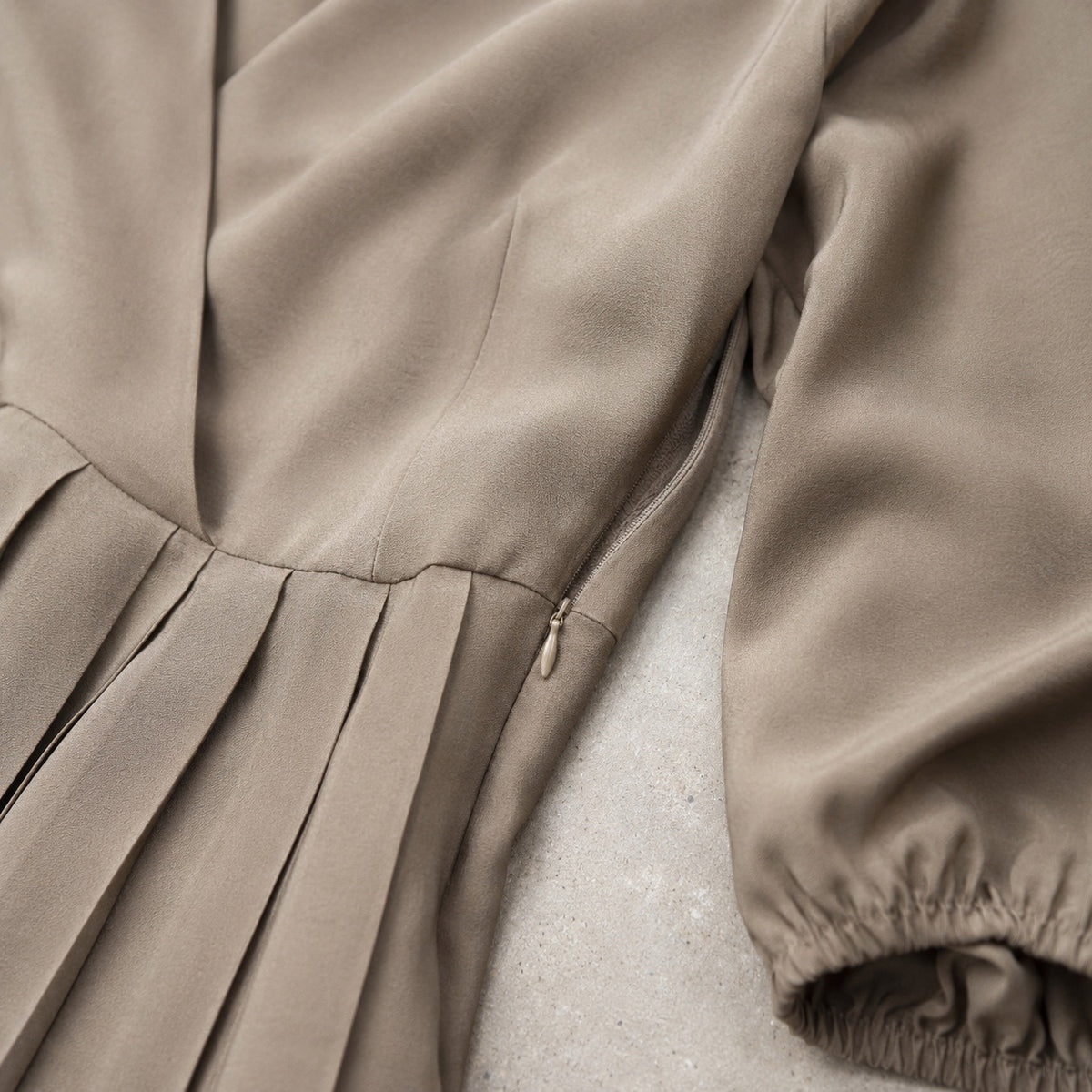 detail shot of the fabric — Downe sunray-pleat midi dress, Pleated Midi Dresses by ORASCI.